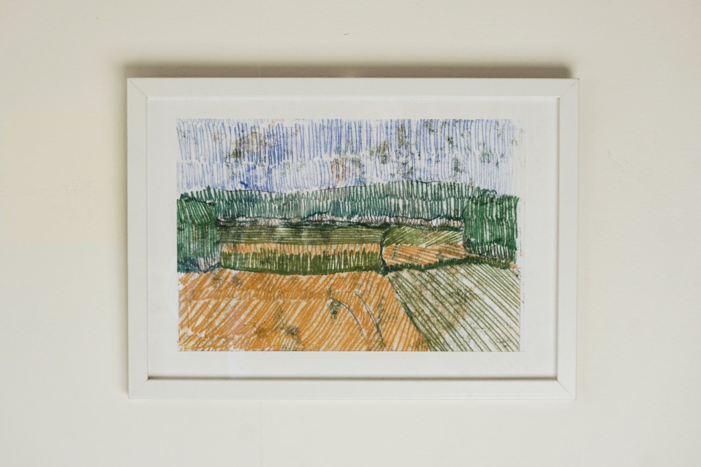 Inramat konstverk, landskap.