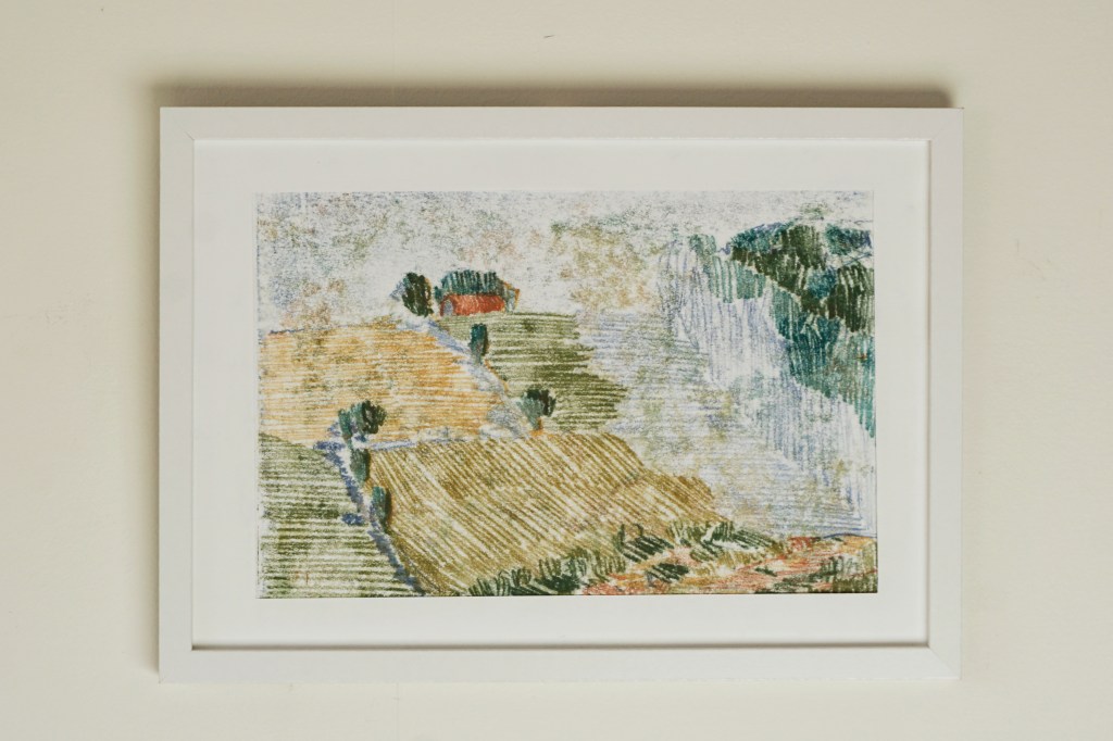 Inramat konstverk, landskap.